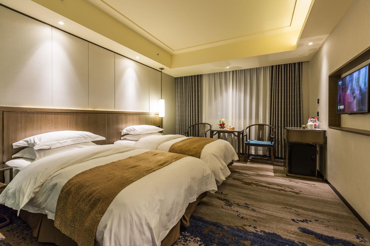 Oriental Hotel Tong Xiang Jiaxing Exterior photo